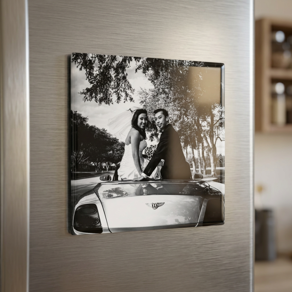 Black and white wedding photo printed as a glossy 3 inch square magnet on a stainless steel refrigerator door